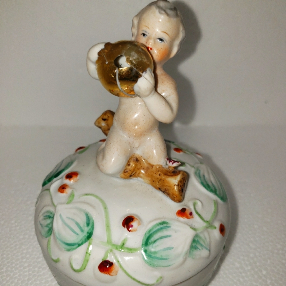 Boy Holding Bell Trinket Box